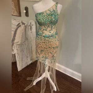Riva Designs Nude Sheer Cocktail Dress with Green Crystal Embellishments